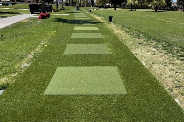 Charlotte Outdoor tee line with light green synthetic grass boxes inside a dark green synthetic grass strip